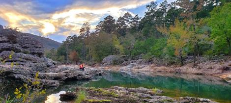 Praying by a river 