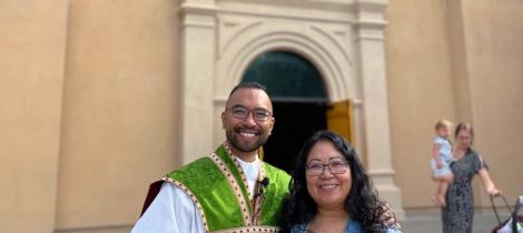 Brother and sister in front of church 