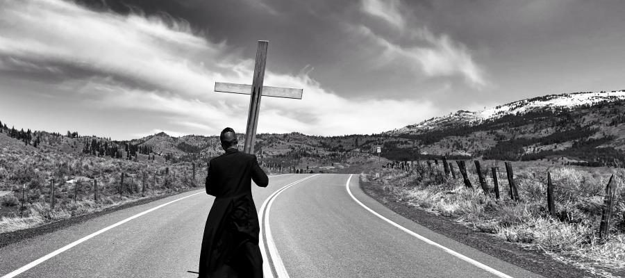 Priest on a country road