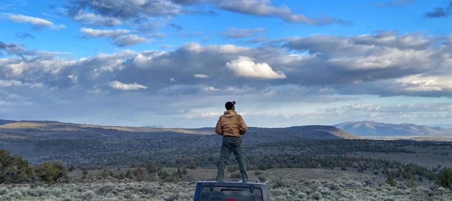 Standing on a jeep 