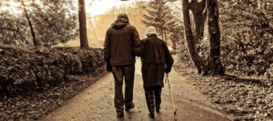 old man and lady walking