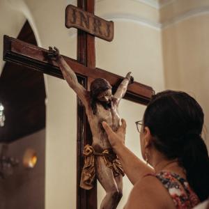 touching the cross 